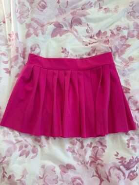Hot pink pleated mini skirt